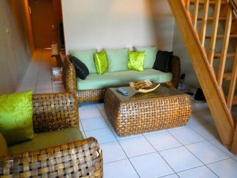 Posezení v ubytování le duplex à DESHAIES,vue mer ,village à pieds