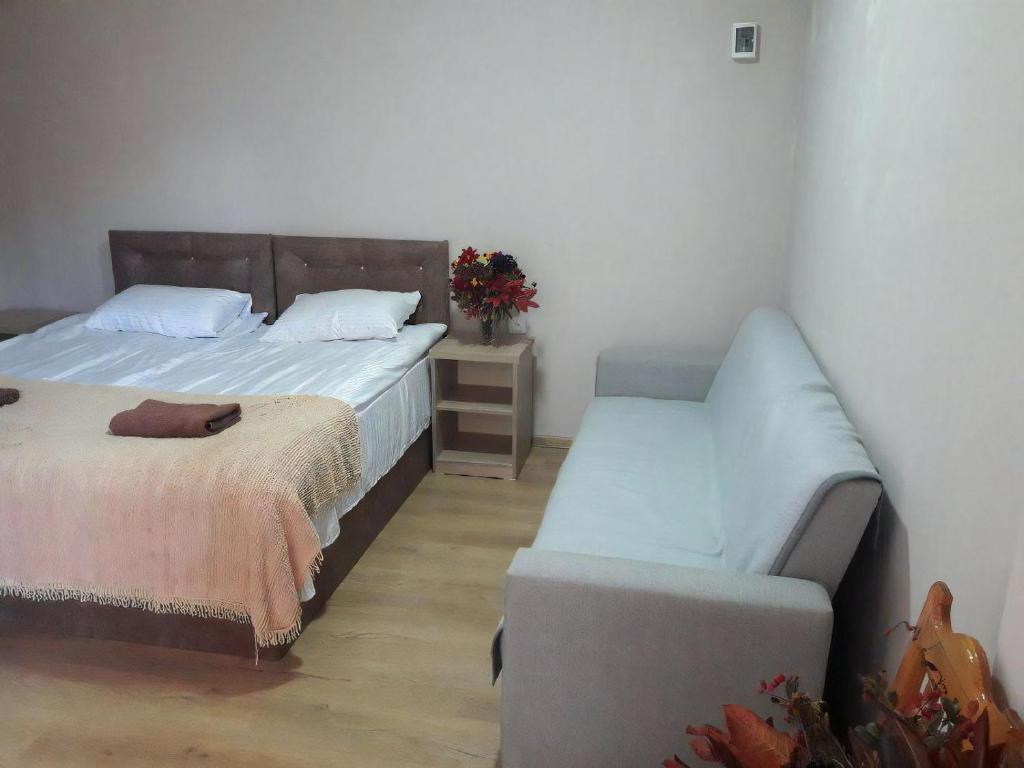 Postel nebo postele na pokoji v ubytování Guest House Mari30