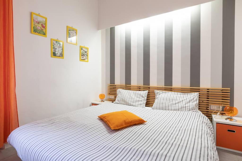 A bed or beds in a room at St Peter Rooms