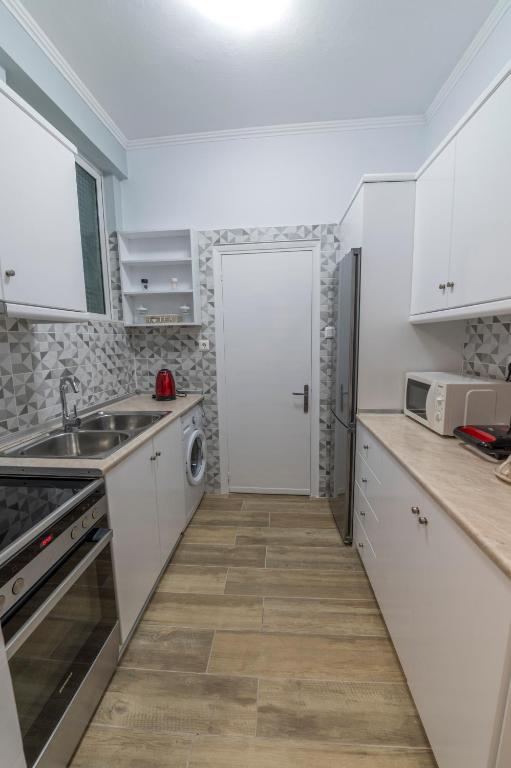 Kuchyň nebo kuchyňský kout v ubytování Armonia Porta Remounda Apartment