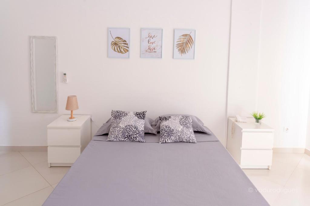 Postel nebo postele na pokoji v ubytování Urban Praia Maria - ApartHotel