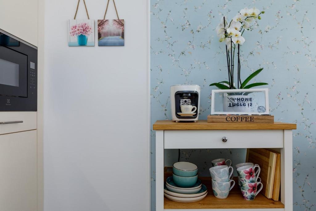 A kitchen or kitchenette at VeronikApartman - brand new & cozy - with underground garage