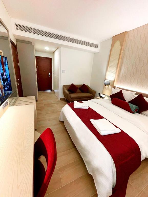 Postel nebo postele na pokoji v ubytování Falaj Daris Hotel