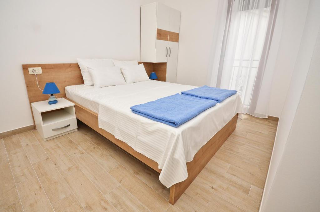 Gospostina Apartment tesisinde bir odada yatak veya yataklar