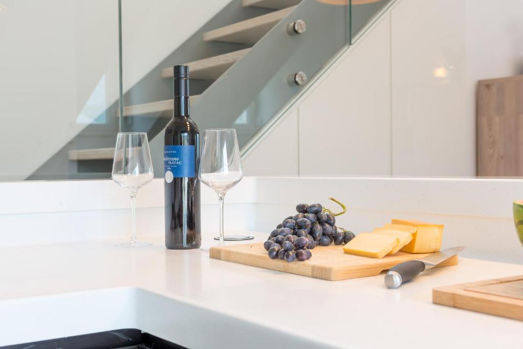 Nápoje v ubytování TopDeck Exclusive Apartment