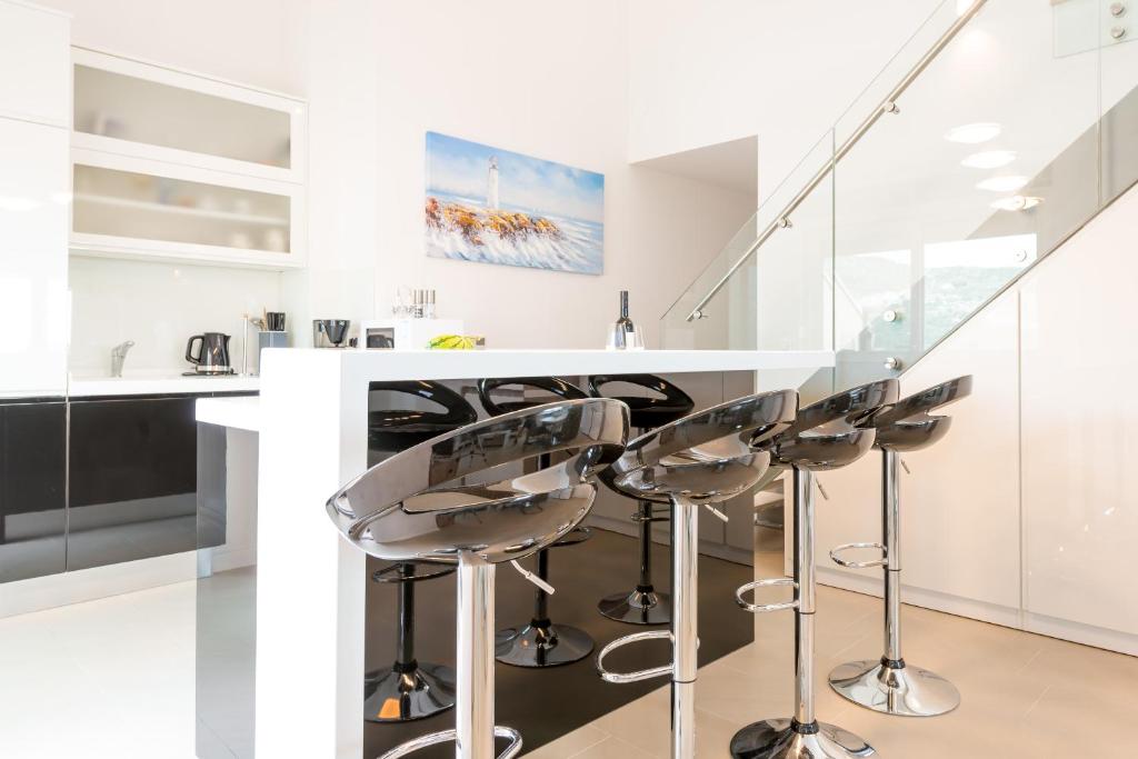Kuchyň nebo kuchyňský kout v ubytování TopDeck Exclusive Apartment