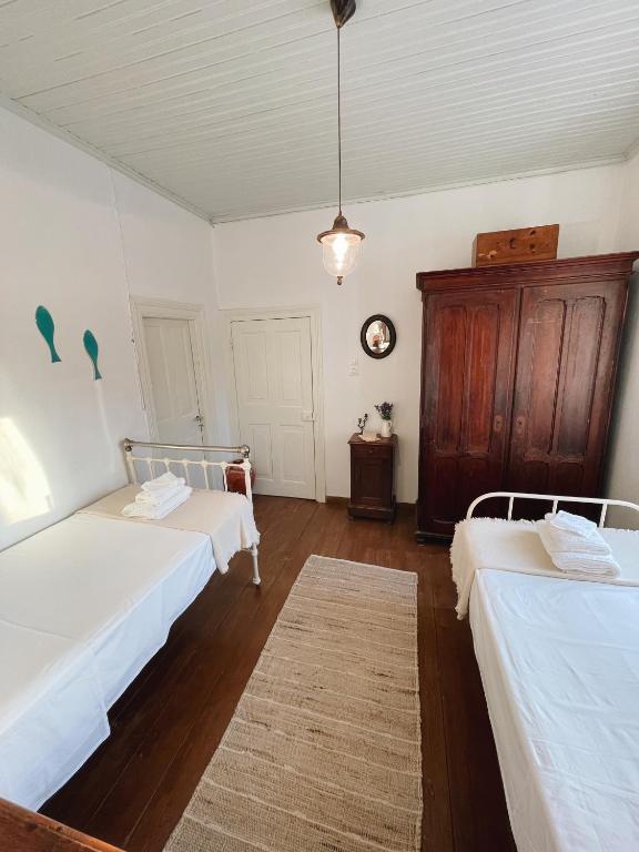 Postel nebo postele na pokoji v ubytování Dolce Vivere by Konnect, Gaios Paxos