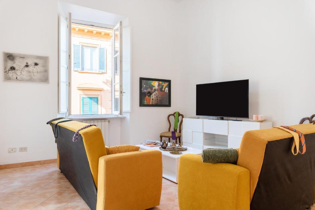 Telewizja i/lub zestaw kina domowego w obiekcie Borgo Stretto Bright Apartments