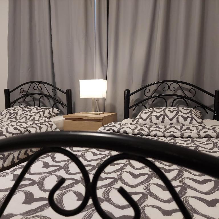 Voodi või voodid majutusasutuse COCO Guesthouse toas