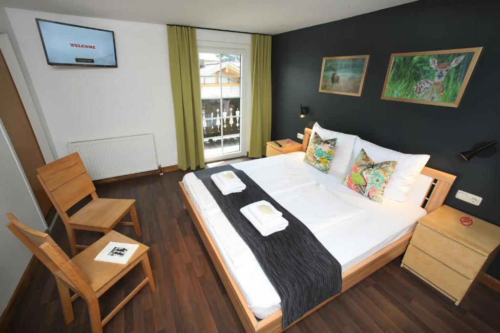 Postel nebo postele na pokoji v ubytování Seehotel Sissi