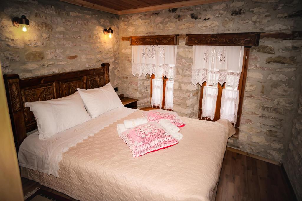 Postel nebo postele na pokoji v ubytování Medieval Rooms