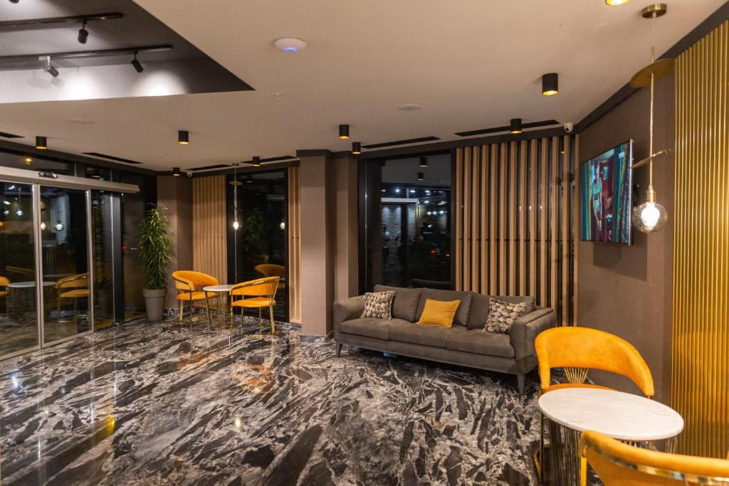 Posezení v ubytování Cozy Loft Hotel