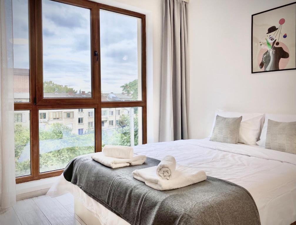 Postel nebo postele na pokoji v ubytování Modern Studio for 4 persons with Fast Wi-fi