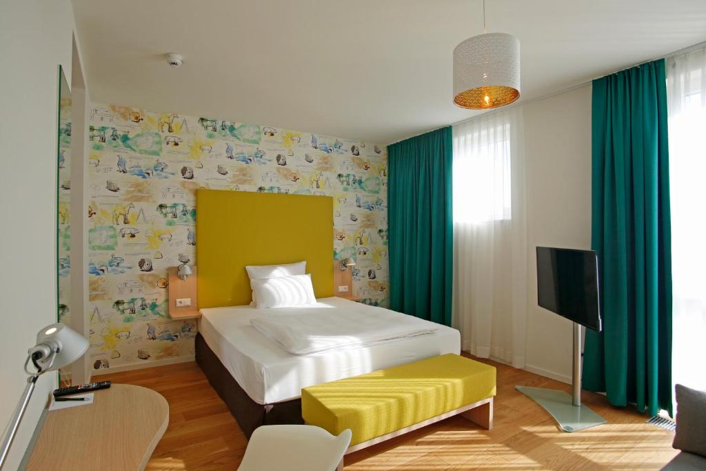 En eller flere senger på et rom på Grimm´s Berlin Potsdam