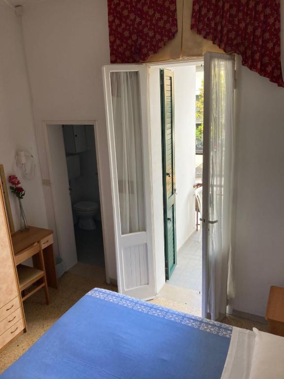 Postel nebo postele na pokoji v ubytování Hotel Villa Sorci