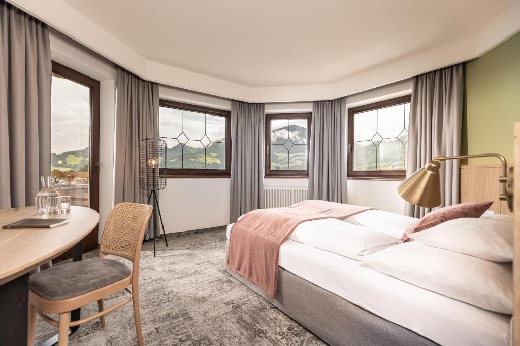Postel nebo postele na pokoji v ubytování Hotel Pirchnerhof
