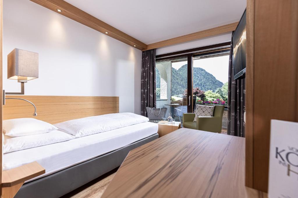 Postel nebo postele na pokoji v ubytování Hotel Pirchnerhof