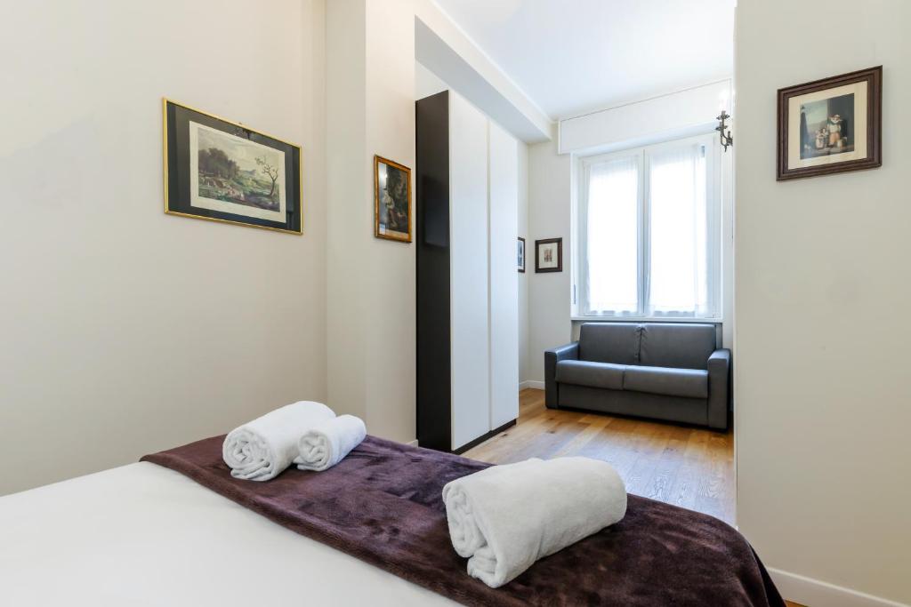 Posteľ alebo postele v izbe v ubytovaní Milan Retreats Cadorna Duomo