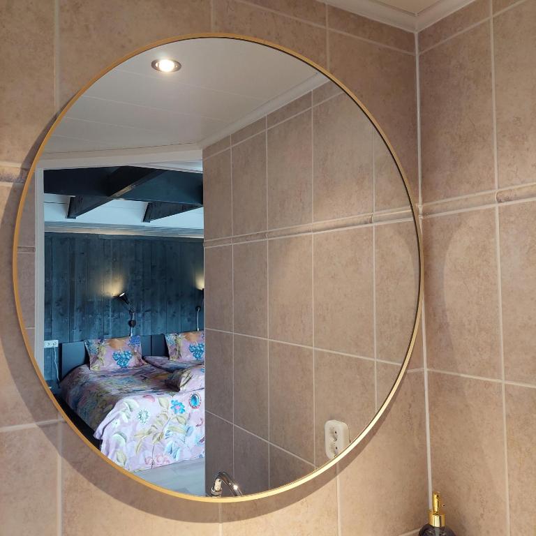 Postel nebo postele na pokoji v ubytování B&B in de Dorpsstraat