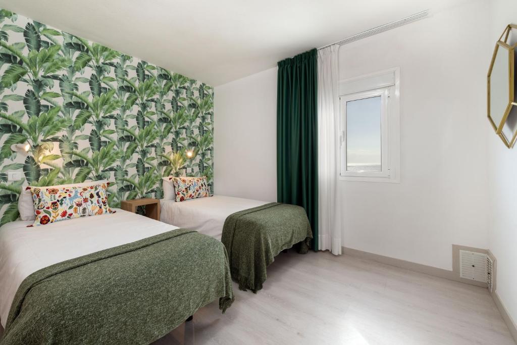 Postel nebo postele na pokoji v ubytování Roca Verde - Playa del Inglés