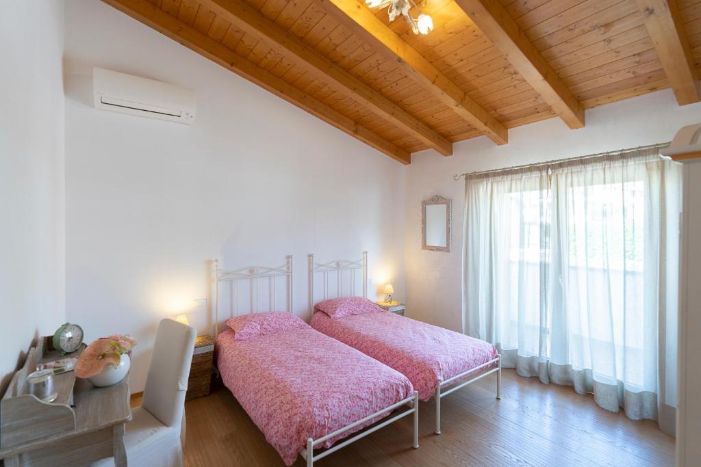 Postel nebo postele na pokoji v ubytování Agriturismo Bressani