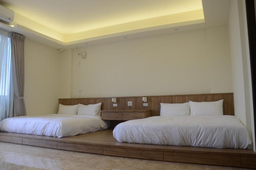 Ένα ή περισσότερα κρεβάτια σε δωμάτιο στο Rebecca Hostel