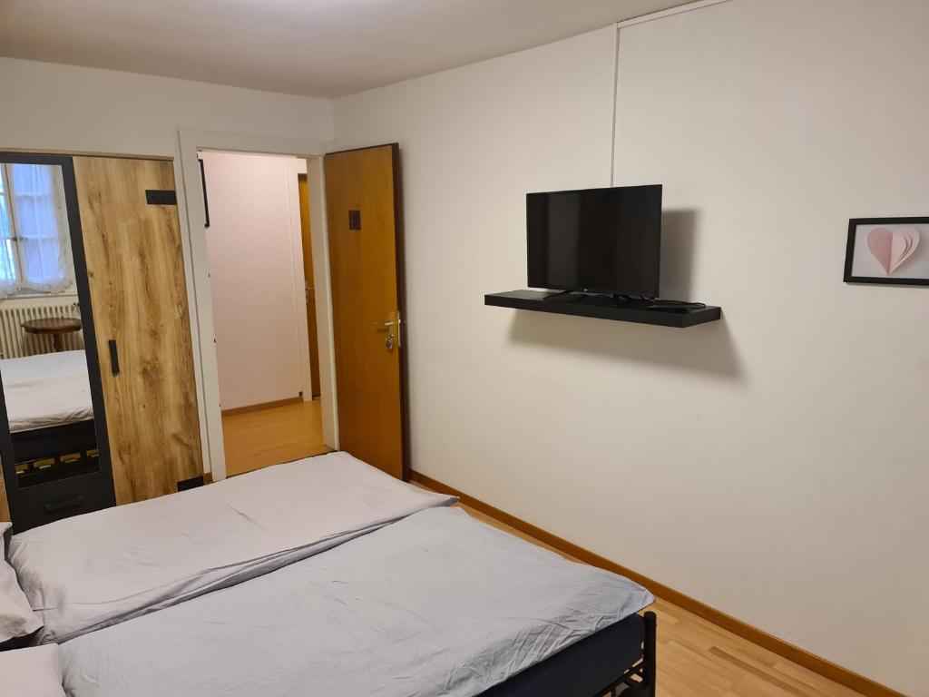 Postel nebo postele na pokoji v ubytování Auberge de Ballens