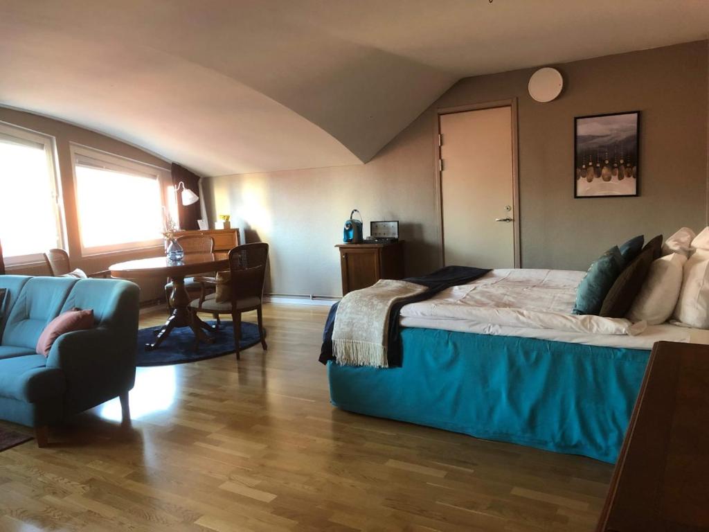 Postel nebo postele na pokoji v ubytování First Hotel Statt Örnsköldsvik