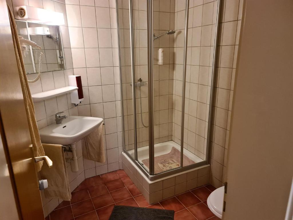 Koupelna v ubytování Auberge de Ballens