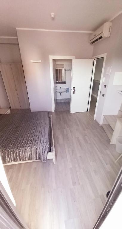 Posteľ alebo postele v izbe v ubytovaní Hotel Meuble' Atlantic