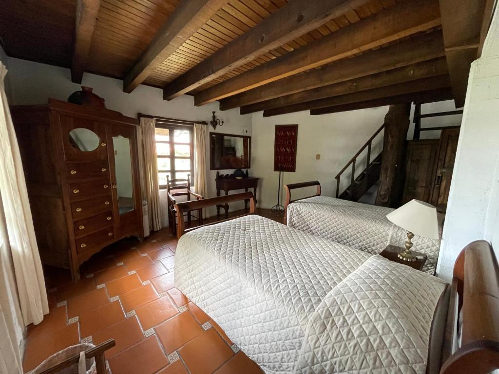 Postel nebo postele na pokoji v ubytování Cortijo 7