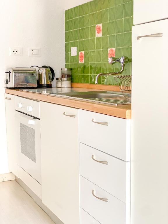 Kuchyň nebo kuchyňský kout v ubytování La Polena Camere Vernazza - Visconti Apartment