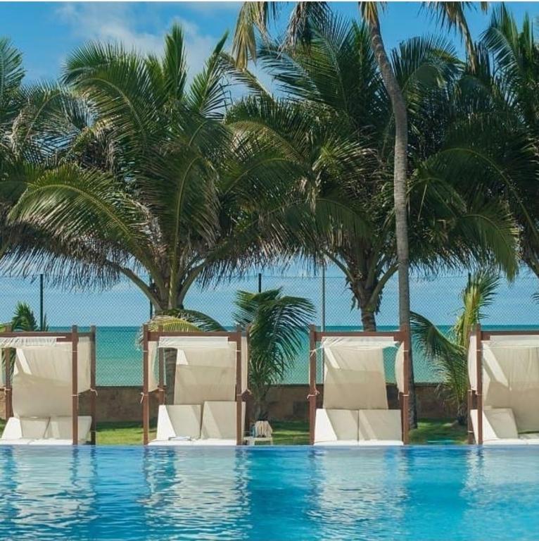 Bazén v ubytování JATIÚCA SUITES RESORT - Flat FRENTE MAR nebo v jeho okolí