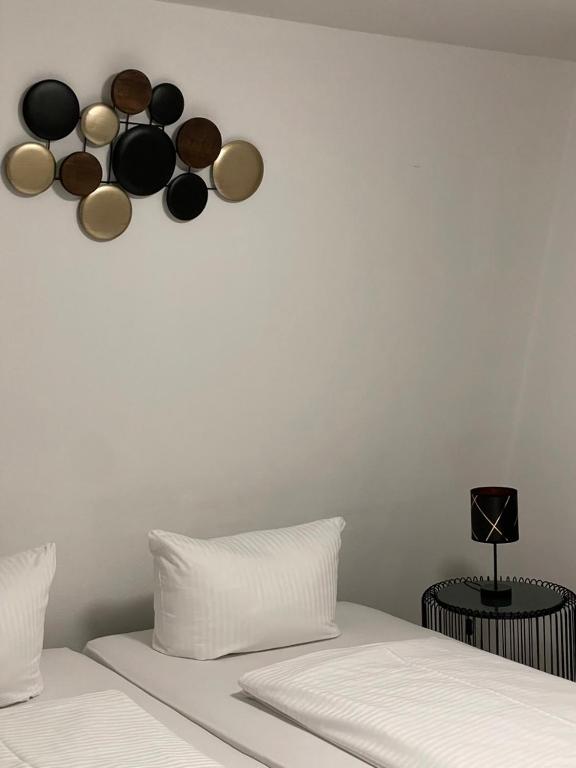 Postel nebo postele na pokoji v ubytování A&C Hotel