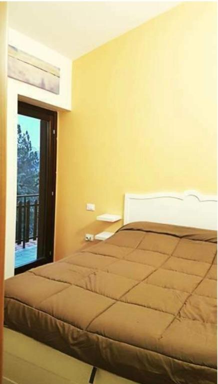 Łóżko lub łóżka w pokoju w obiekcie La casa di Olivia