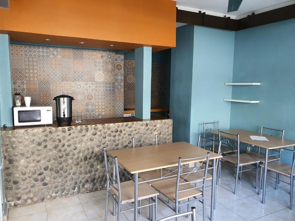 Kuchyň nebo kuchyňský kout v ubytování Hotel El Faro Malecon