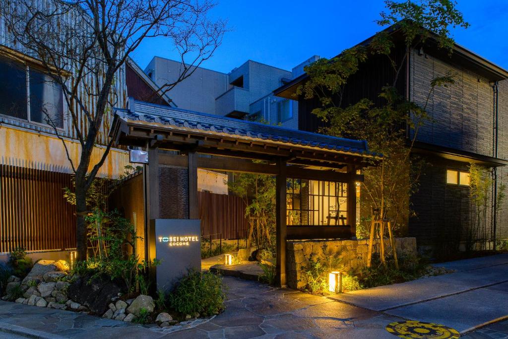 a house with lights on the side of it at Tosei Hotel Cocone Kamakura in Kamakura
