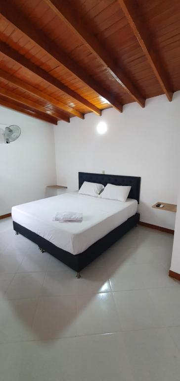 Postel nebo postele na pokoji v ubytování Hotel Picasso 70