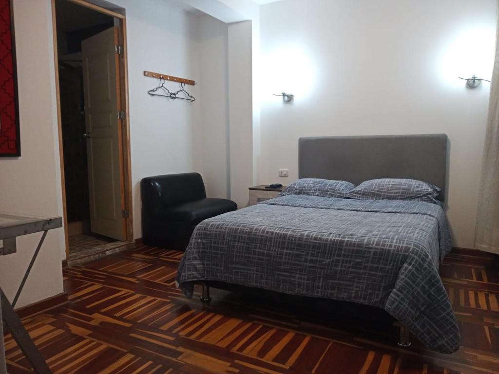 Postel nebo postele na pokoji v ubytování Peruvian Family Hostal Miraflores