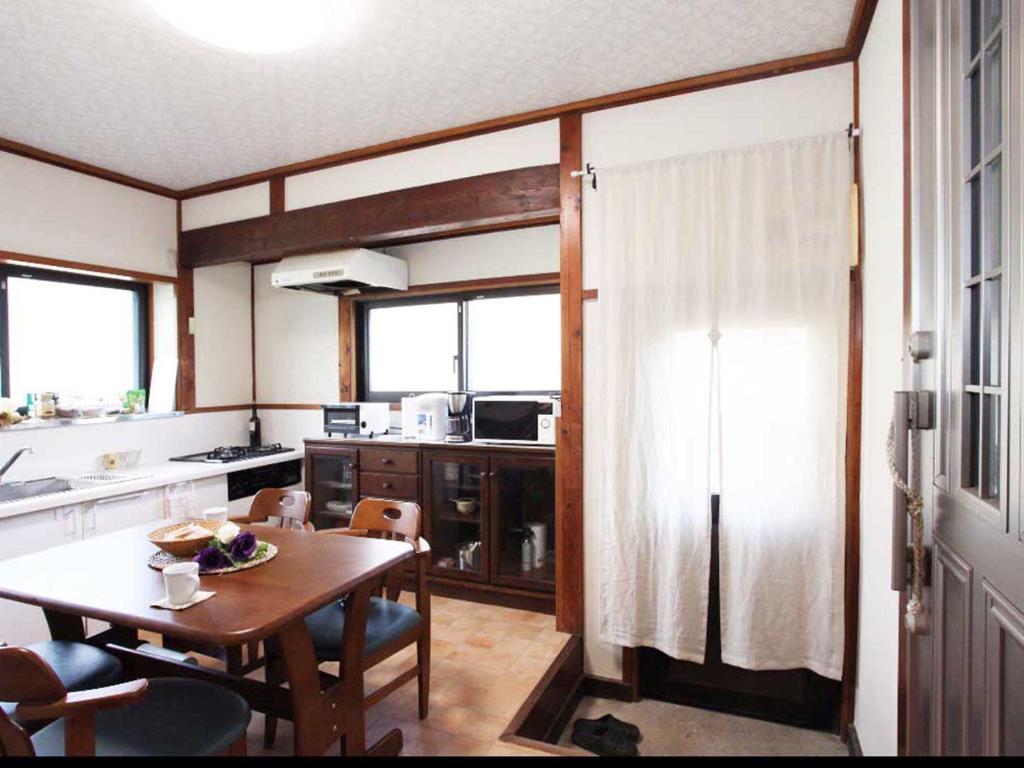 Kuchyň nebo kuchyňský kout v ubytování Guest House Zen