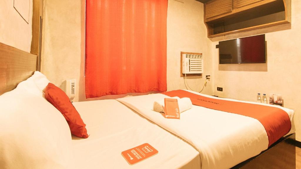 Postel nebo postele na pokoji v ubytování RedDoorz @ Good 101 Quiricada Manila