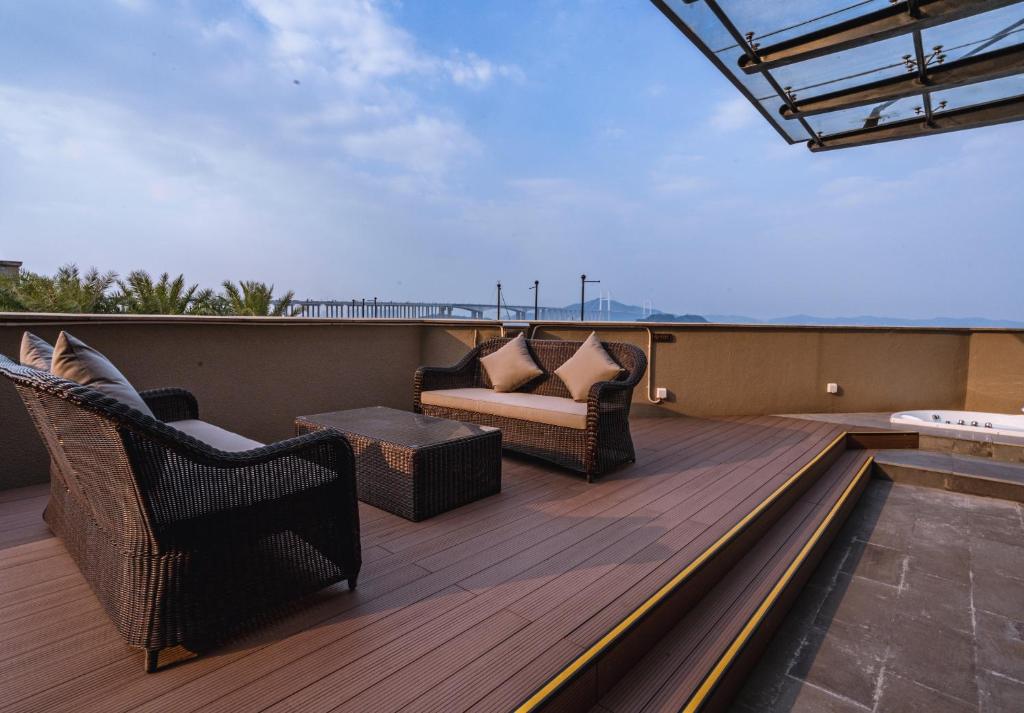 Balkón nebo terasa v ubytování Guangzhou Nansha Stone Inn