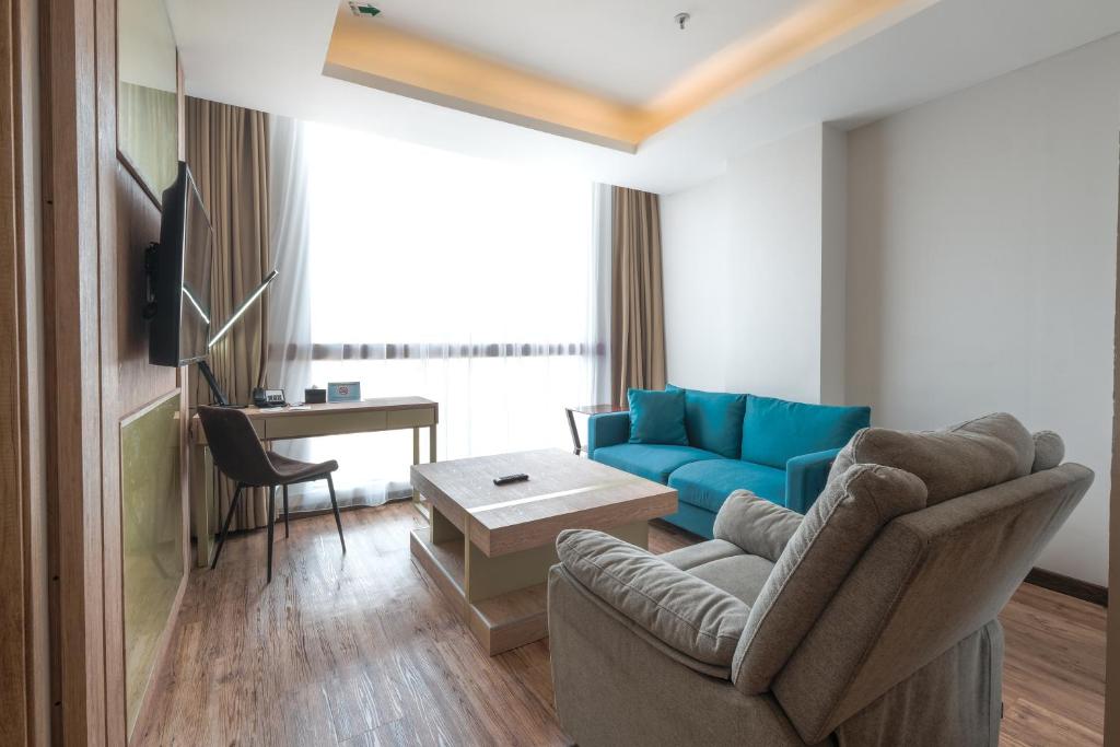 Posezení v ubytování Bigland Bogor Hotel Powered by Archipelago