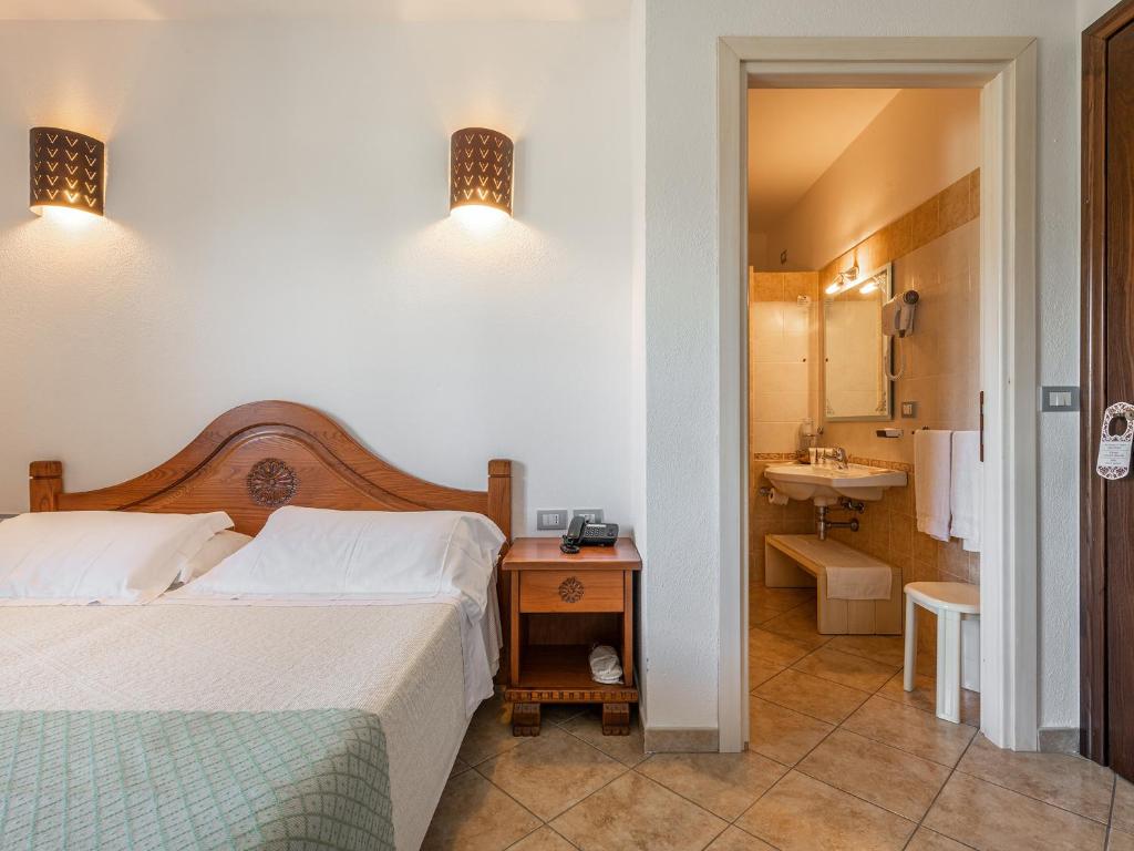 Voodi või voodid majutusasutuse Hotel RaffaEl toas