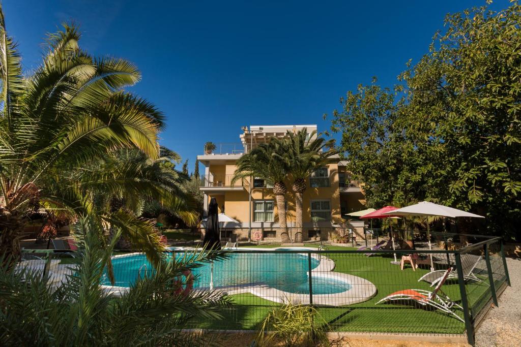 The swimming pool at or close to Apartamentos El Palmeral de Madaria