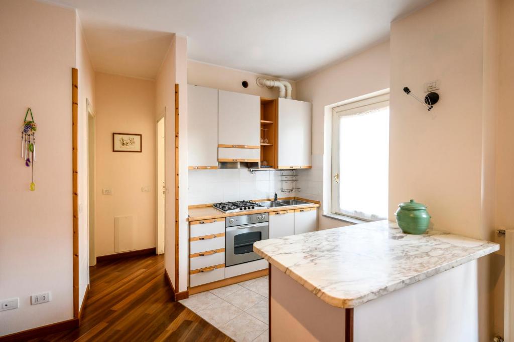 A kitchen or kitchenette at Cantina Anzivino - Affittacamere