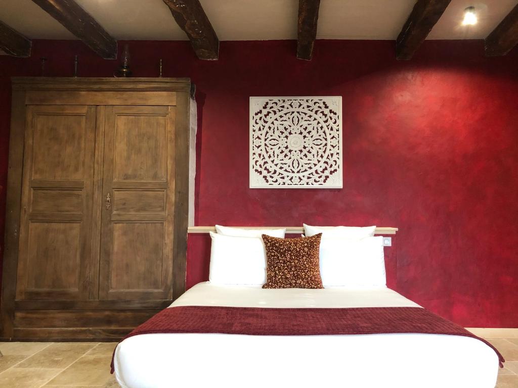 Postel nebo postele na pokoji v ubytování Maison Lapopie chambres et gîte