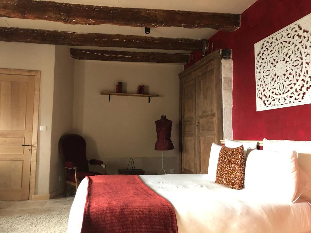 Postel nebo postele na pokoji v ubytování Maison Lapopie chambres et gîte