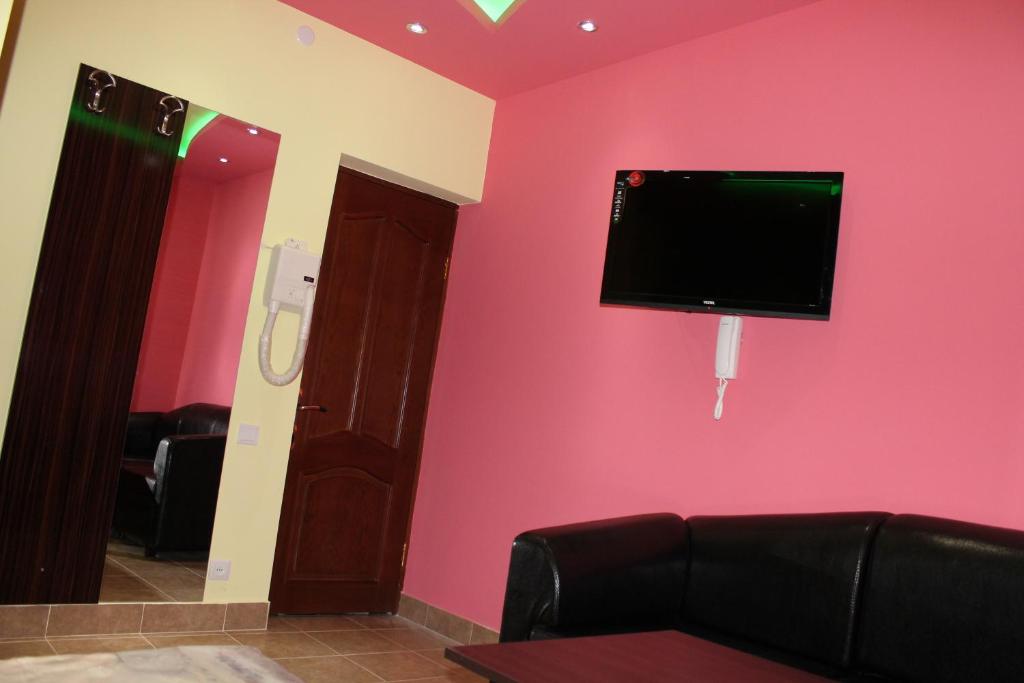 TV a/nebo společenská místnost v ubytování Princ Plaza Hotel