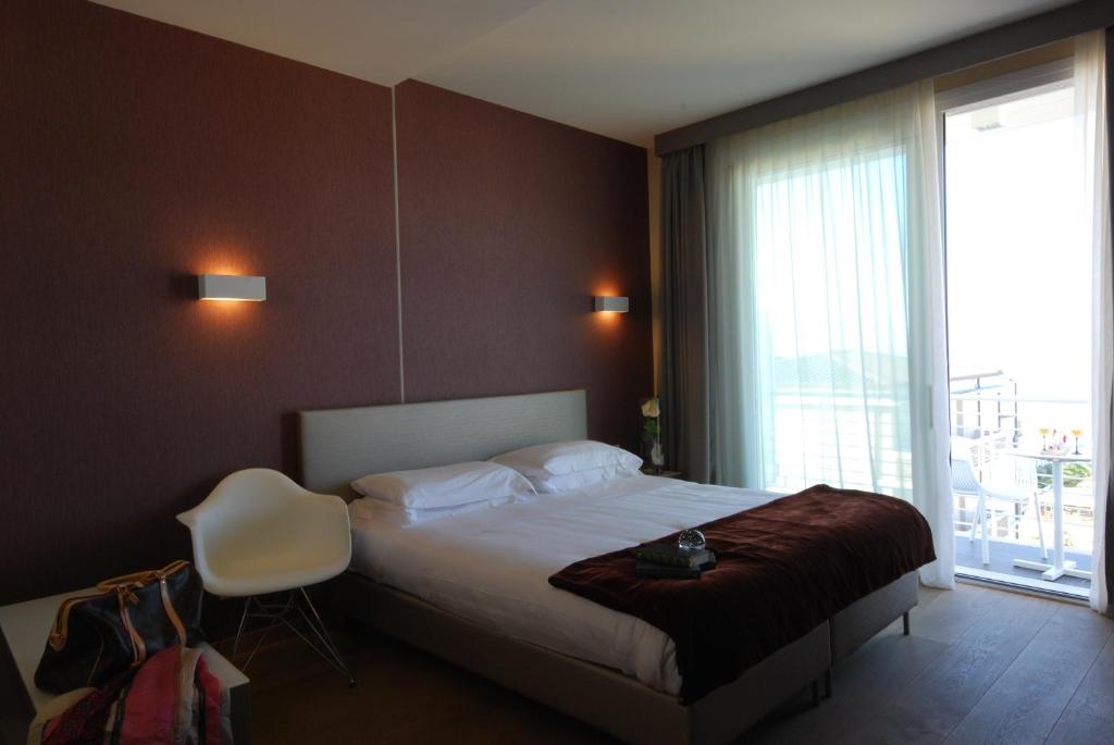 Postel nebo postele na pokoji v ubytování Hotel Bracciotti